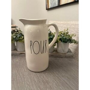 Rae Dunn ceramic pitcher featuring the word "POUR"